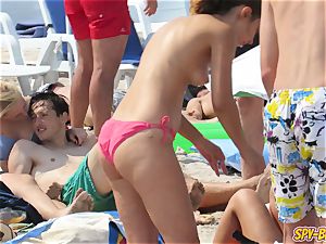 scorching big globes sans bra unexperienced teens bikini Beach hidden cam